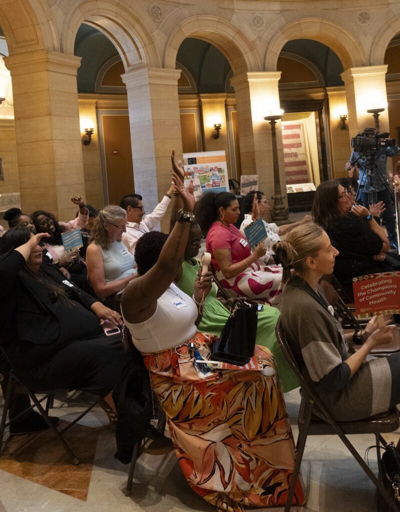 Community Health Workers (CHWs), healthcare leaders, policymakers, advocates, and allies celebrating their impact on local MN communities