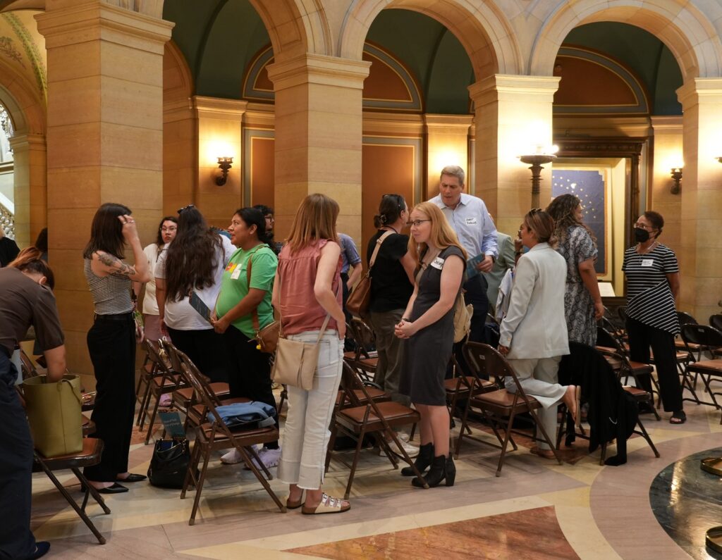 Attendees catching up with colleagues and meeting new ones