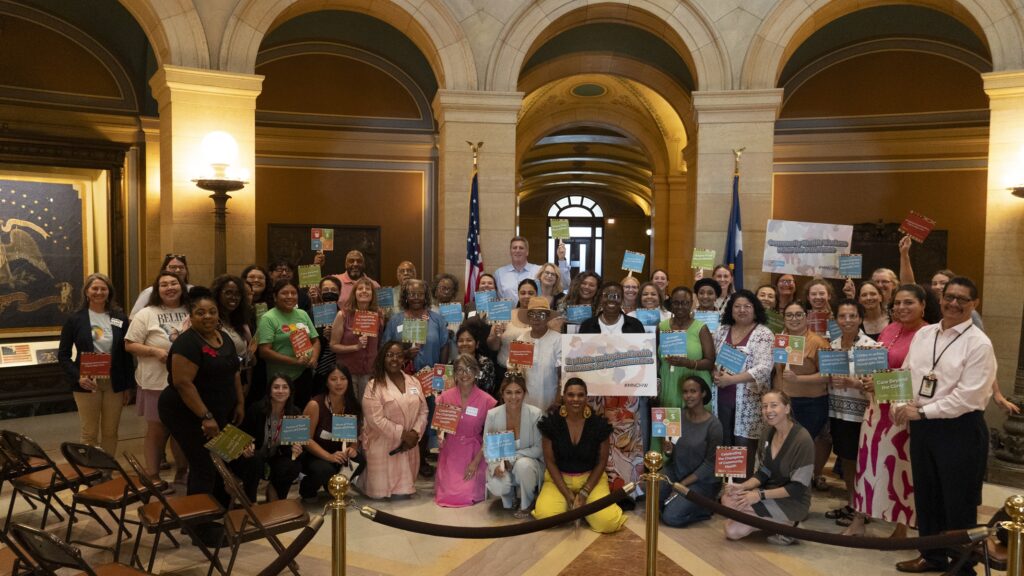 Community Health Workers (CHWs), healthcare leaders, policymakers, advocates, and allies together at the State Capitol for a group picture